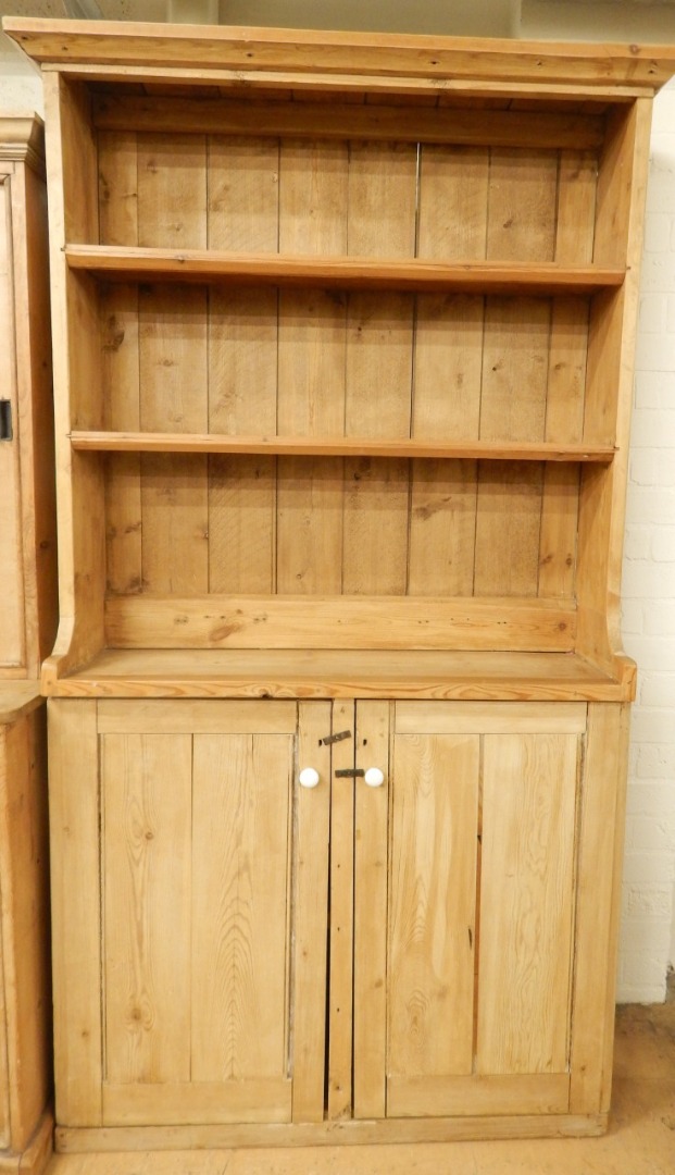 Appraisal: A reclaimed pine dresser the top with a moulded cornice