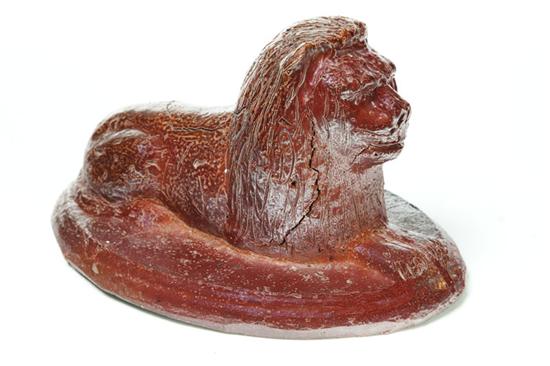 Appraisal: SEWERTILE LION Ohio late th-early th century Reclining lion with