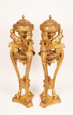 Appraisal: A pair of French style urns and covers on stands