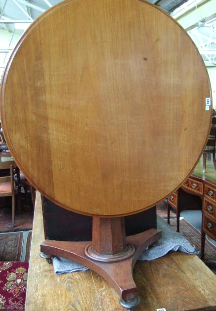 Appraisal: A William IV mahogany circular tilt top table raised on