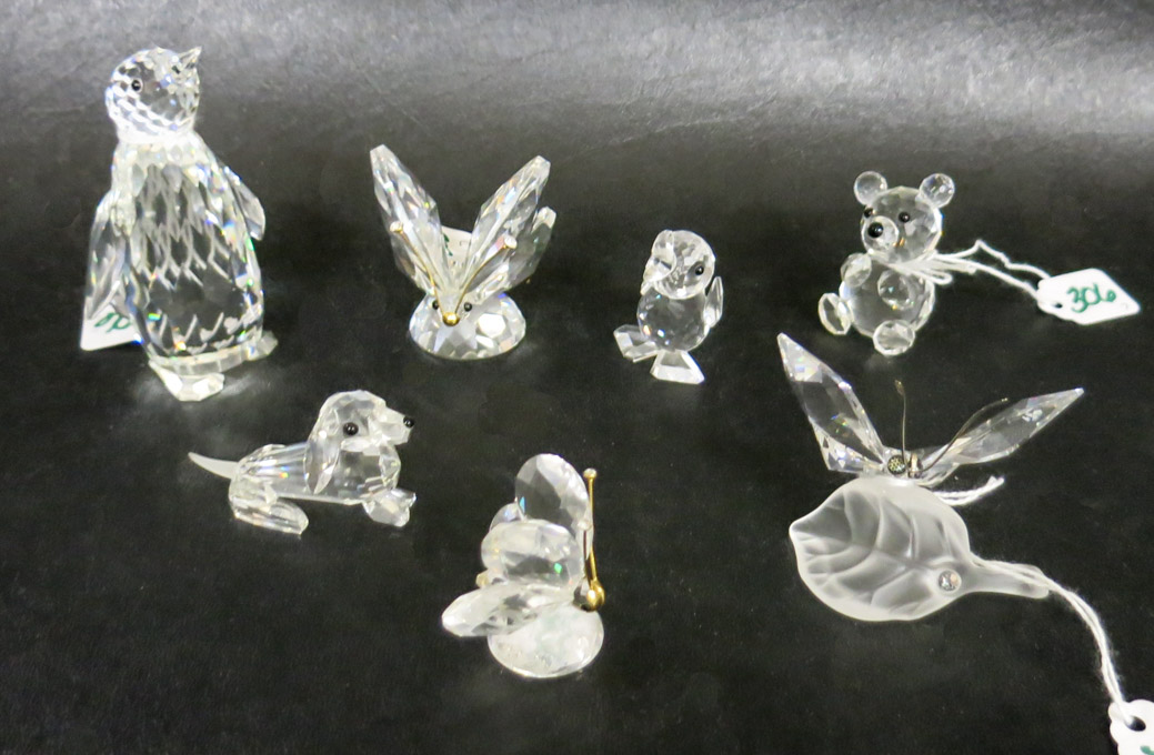 Appraisal: SEVEN SWAROVSKI CRYSTAL FIGURINES including a penguin a duck a