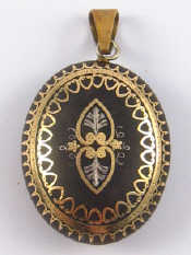 Appraisal: A Victorian tortoiseshell and gold pique work pendant with a