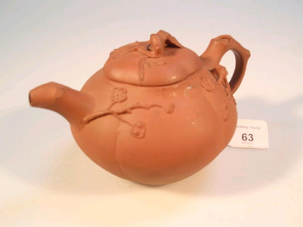 Appraisal: A Ying Sing red ware teapot of melon shape with