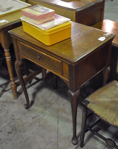 Appraisal: Vintage Electric Sewing MachineIn mahogany veneer cabinet with accessories x