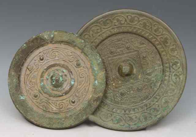 Appraisal: TWO CHINESE BRONZE ARCHAIC STYLE MIRRORS and Han Dynasty BC