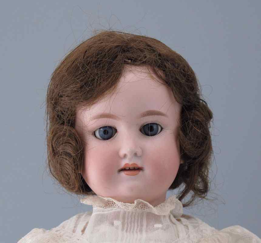 Appraisal: ARMAND MARSEILLE GERMAN BISQUE HEAD DOLL Stationary blue glass eyes