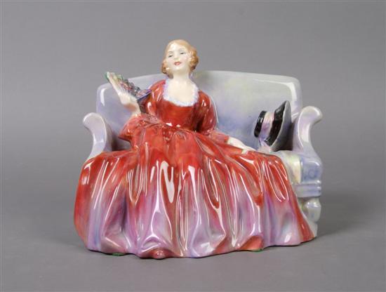 Appraisal: A Royal Doulton Porcelain Figure Width inches