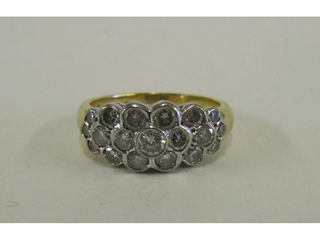 Appraisal: Eighteen carat bi colour gold diamond cluster ring with collet