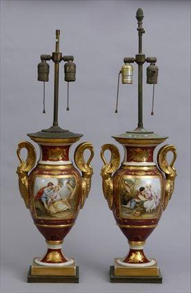 Appraisal: PAIR OF PARIS PORCELAIN-TYPE URNS MOUNTED AS LAMPS Each with