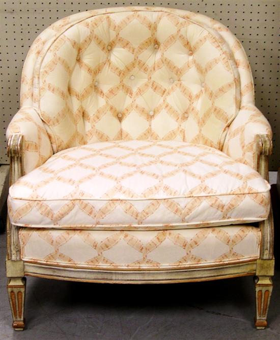 Appraisal: French style armchair antiqued white frame peach and cream upholstery