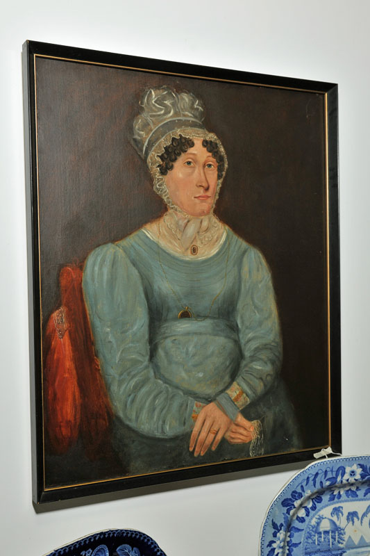 Appraisal: PORTRAIT OF A WOMAN Framed oil on canvas depicting a