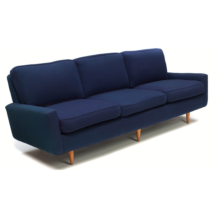 Appraisal: Knoll sofa upholstered seat over tapered birch legs dark blue