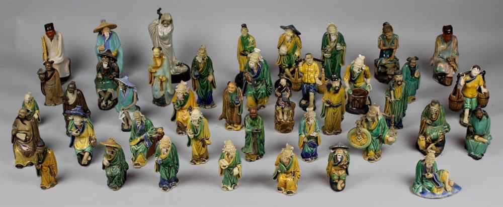 Appraisal: GROUP OF FORTY-ONE CHINESE GLAZED POTTERY FIGURES the male figures