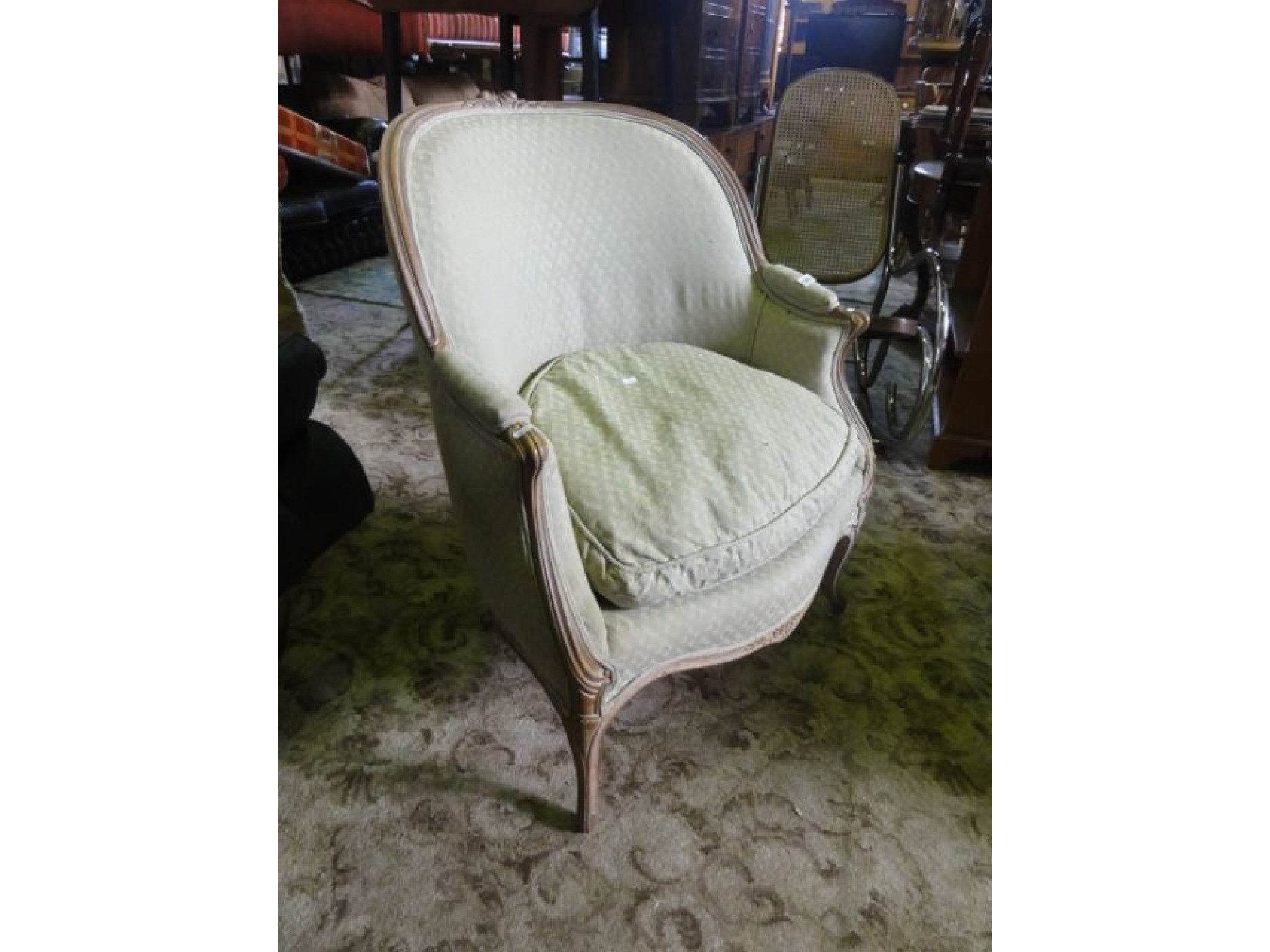 Appraisal: A French drawing room chair with shaped outline sprung upholstered