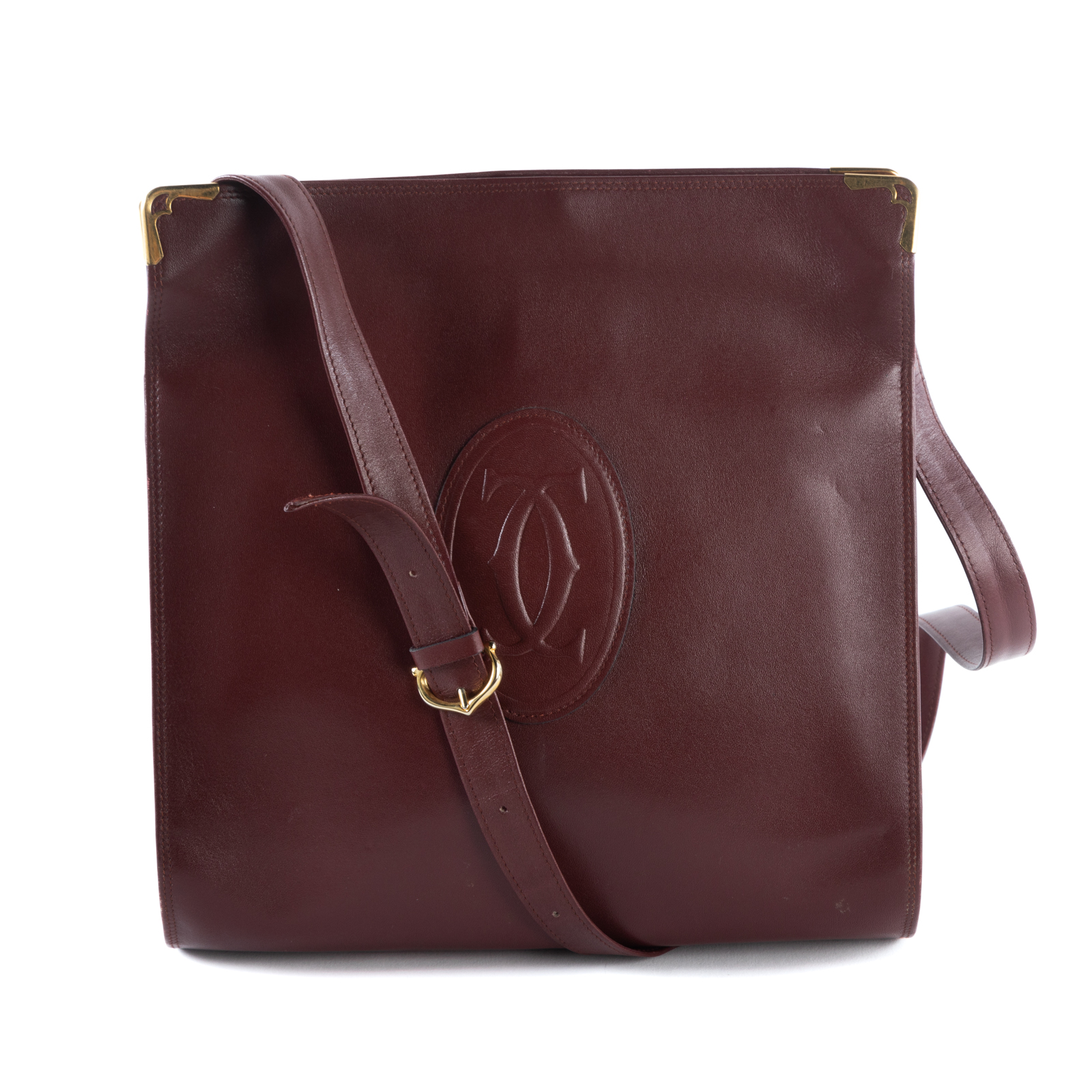 Appraisal: A CARTIER CLASP CROSSBODY A burgundy calf leather Cartier Clasp