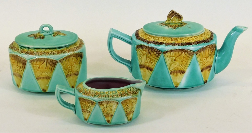 Appraisal: PC ENGLISH MAJOLICA FAN AND BIRD TEA SET English Late