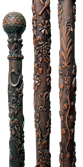 Appraisal: Folk-Art Cane- Ca - An ornately carved one-piece shaft with