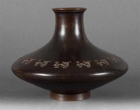 Appraisal: Chinese bronze vase impressed dragon ring decoration in H Estimate