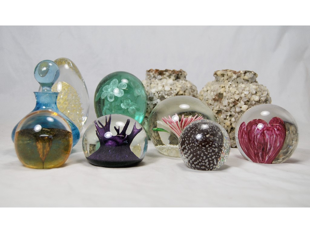 Appraisal: A floral Stourbridge dump seven other paperweights and a pair