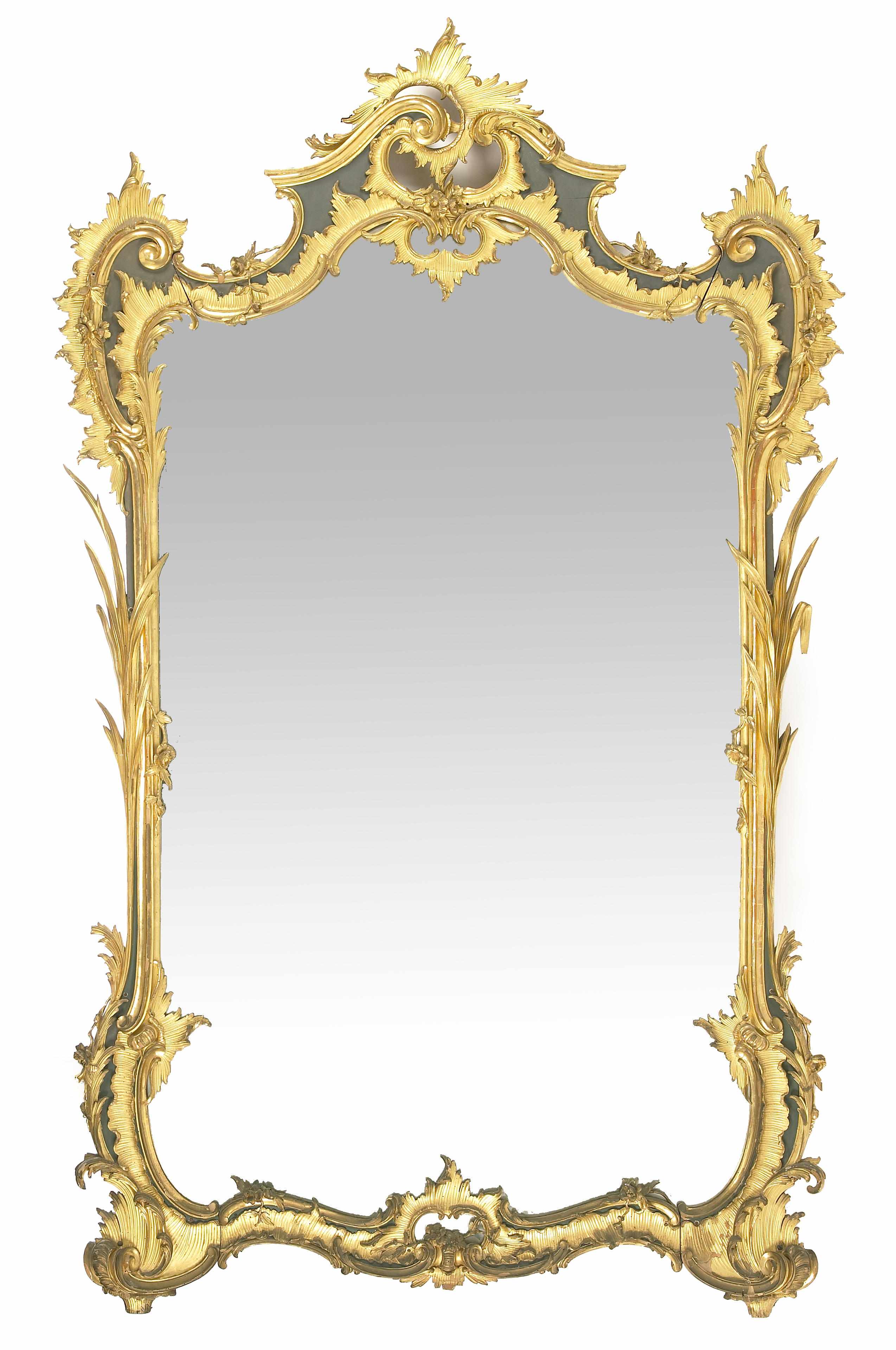 Appraisal: A Louis XV style carved giltwood and parcel ebonized mirror