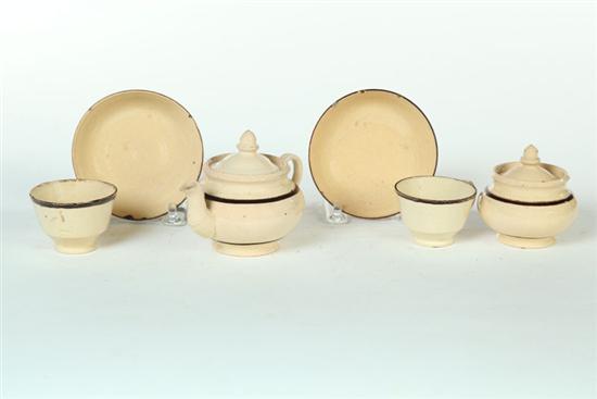 Appraisal: MINIATURE YELLOW WARE TEA SET England nd half- th century