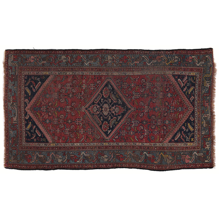 Appraisal: Persian rug c stylized floral design on blue and red