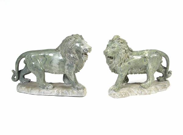 Appraisal: A pair of carved marble lions height in width in