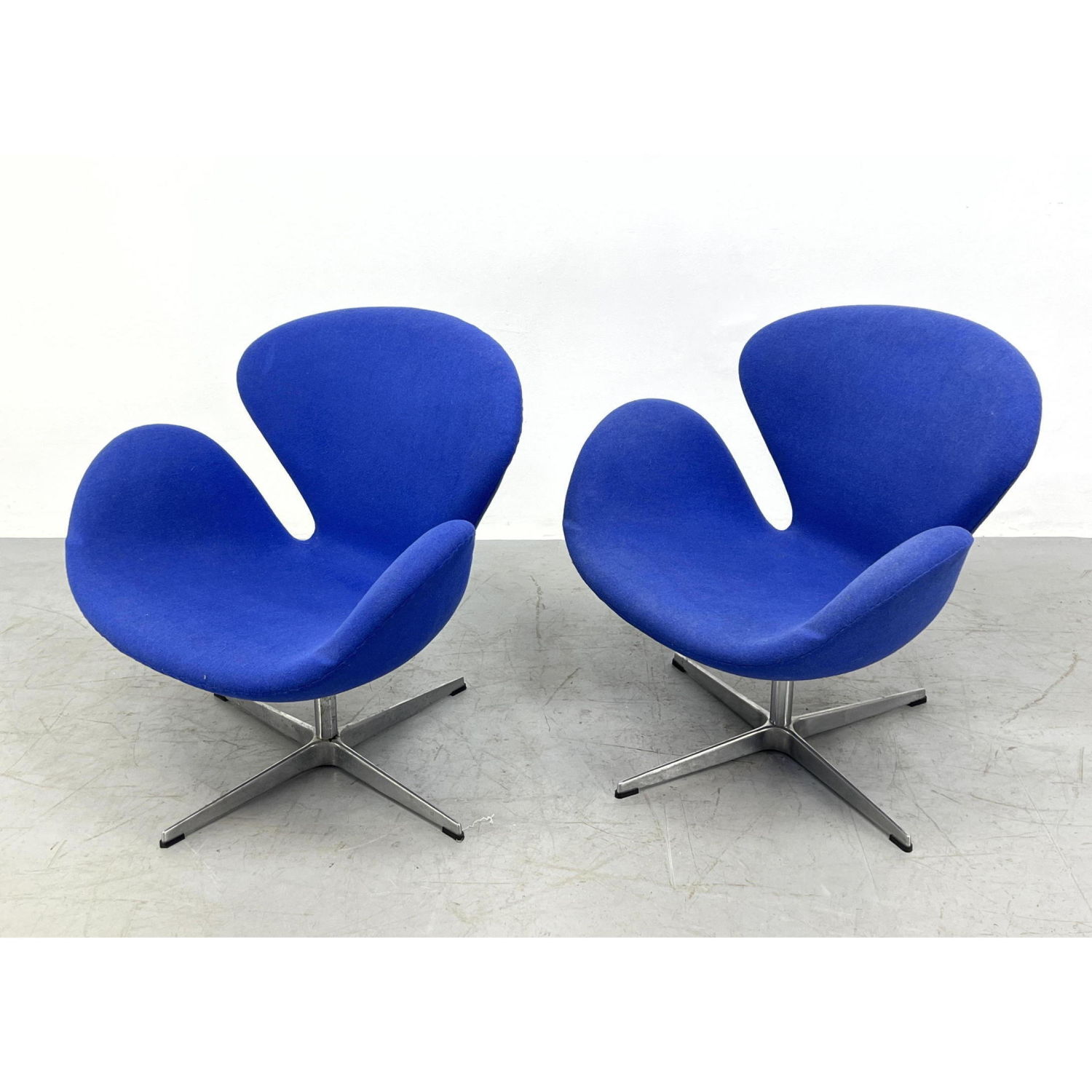 Appraisal: Pair of blue swan chairs After Arne Jacobsen Dimensions H