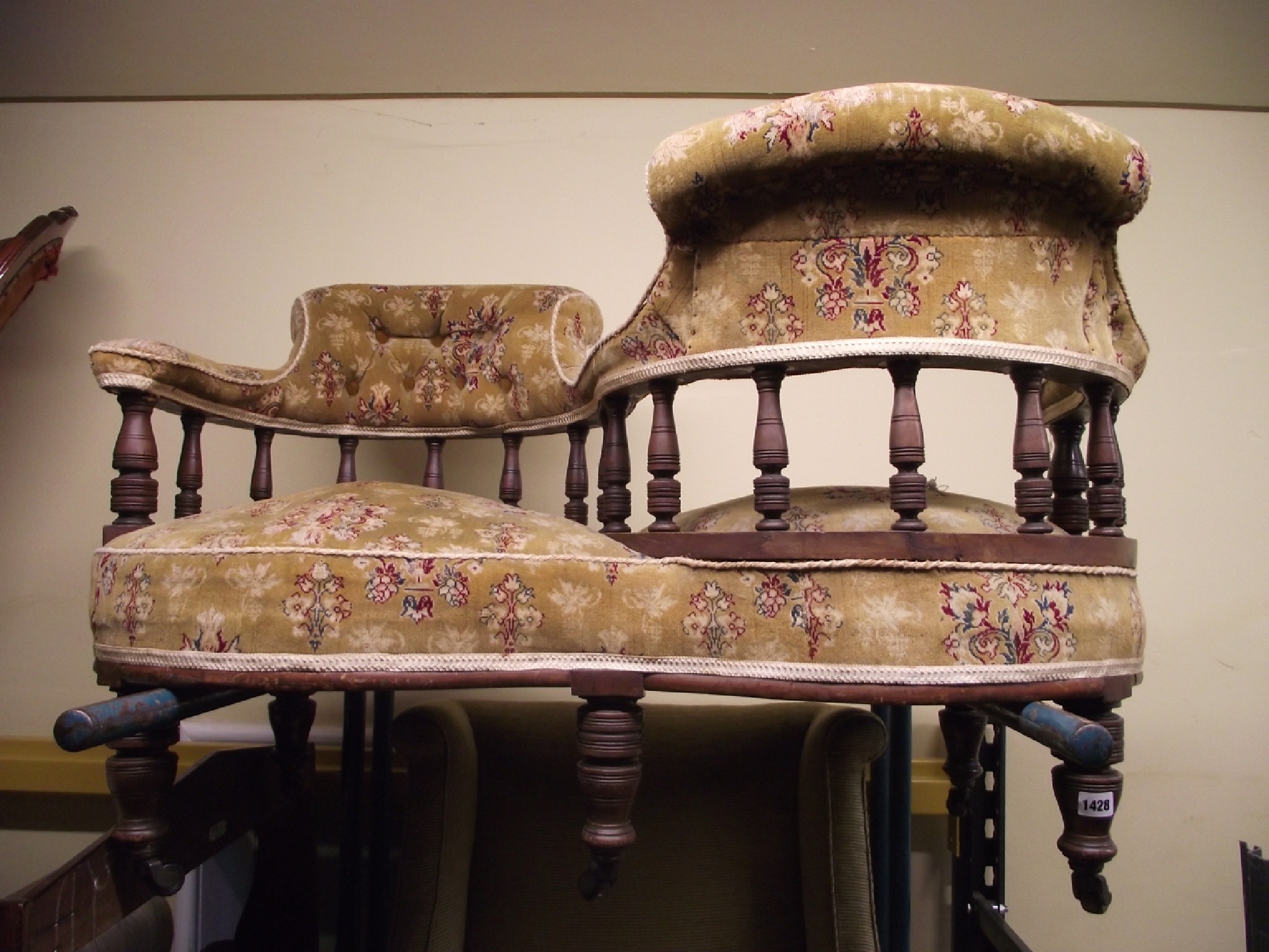 Appraisal: A late Victorian love or conversation seat raised on turned