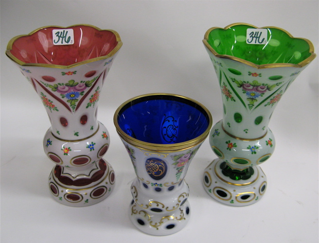 Appraisal: THREE BOHEMIAN CUT OVERLAY GLASS VASES all with hand enameled