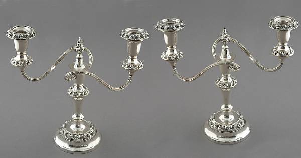 Appraisal: A pair of English silverplated-on-copper triple light candelabra height in