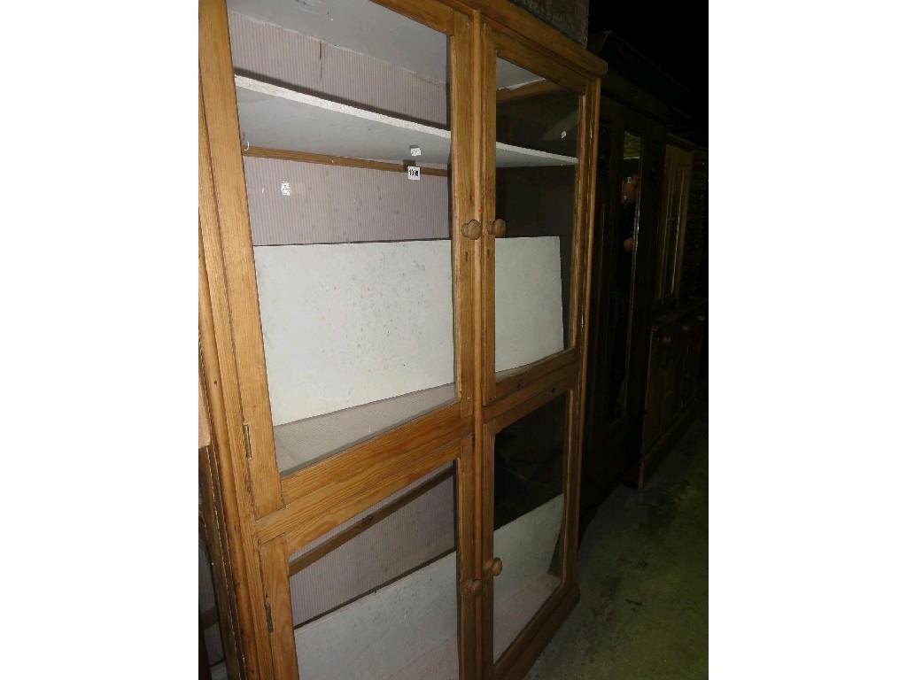 Appraisal: A free standing stripped and waxed pine framed kitchen display