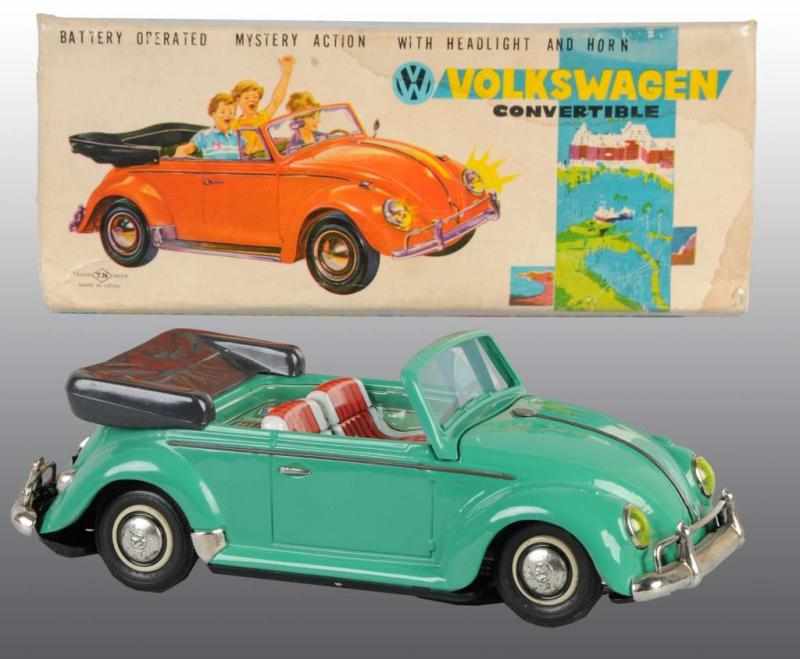 Appraisal: Tin Volkswagen Convertible Battery-Operated Toy Description Japanese Working Made by