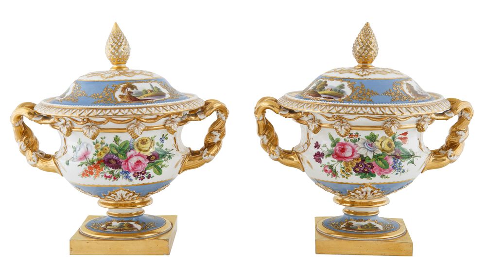 Appraisal: CONTINENTAL PORCELAIN COVERED URNS CONTINENTAL PORCELAIN COVERED URNS each of