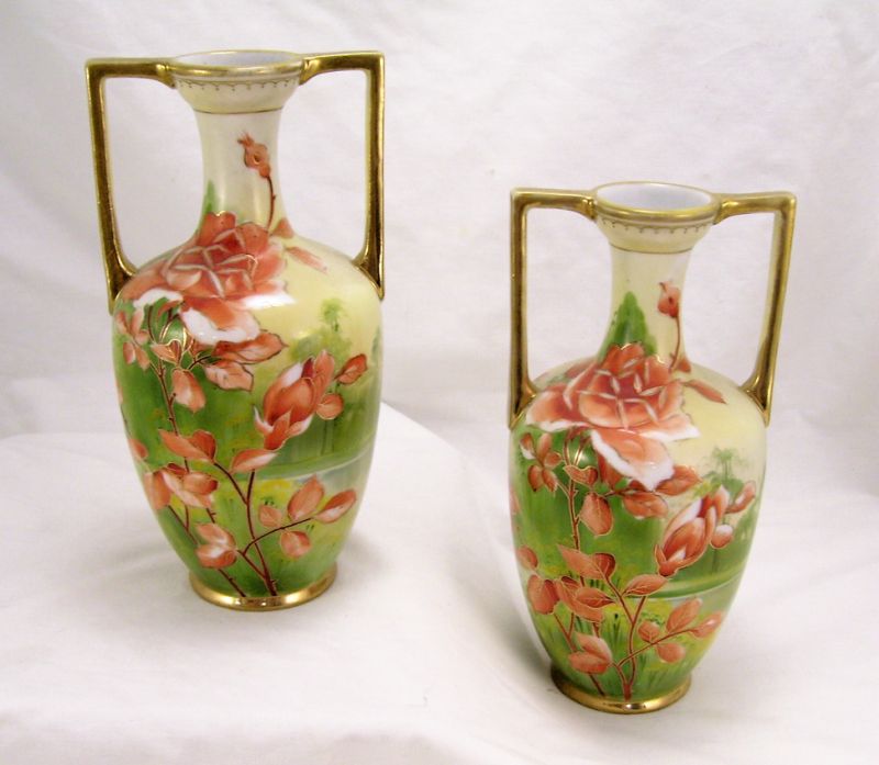 Appraisal: Pair Nippon Porcelain Vases Orange floral decoration over a green