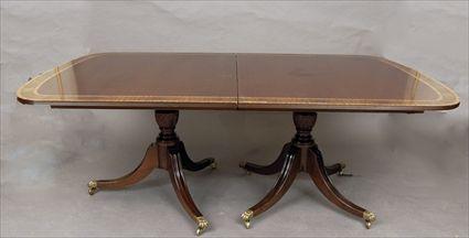 Appraisal: George III-Style Satinwood and Rosewood Inlaid Mahogany Three-Pedestal Dining Table