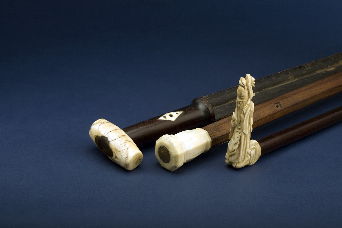 Appraisal: CARVED AND PAINTED OAK WALKING STICK WITH INLAID IVORY DIAMONDS