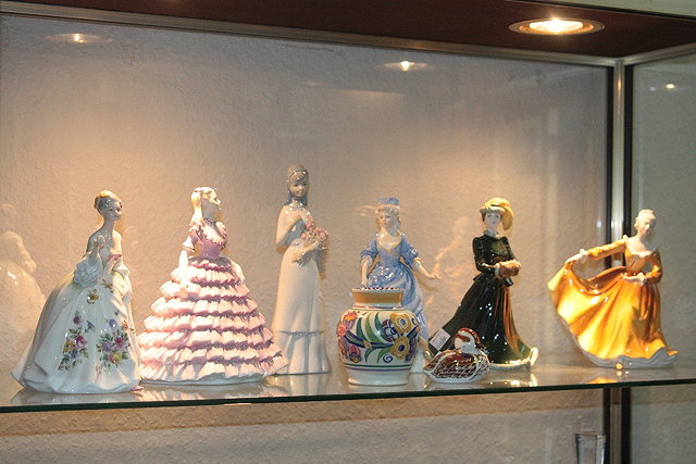 Appraisal: A COLLECTION OF THREE ROYAL DOULTON FIGURES to include Christine