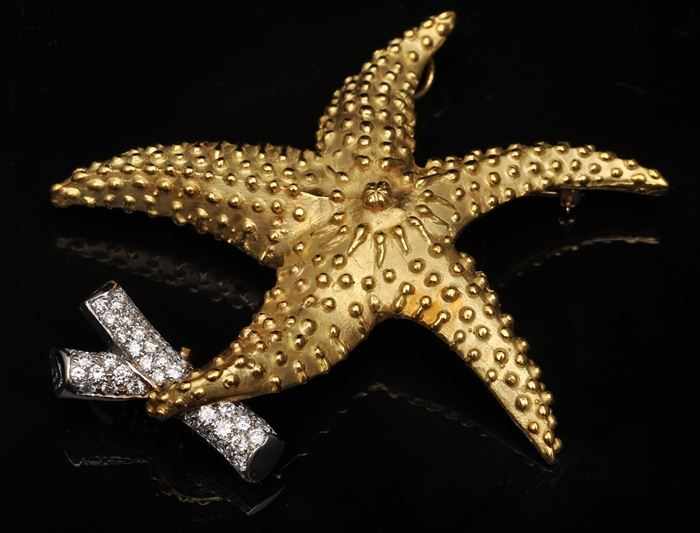 Appraisal: DIAMOND AND GOLD STARFISH BROOCH Unmarked approx x in