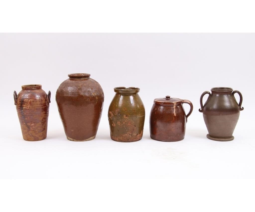 Appraisal: Five pieces of redware stoneware pottery to include a covered