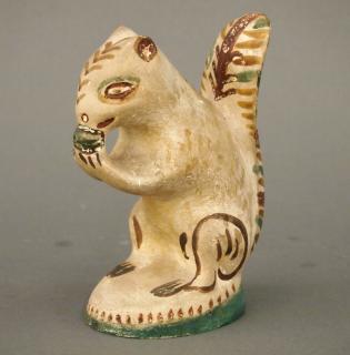 Appraisal: Chalkware squirrel A late th century chalkware squirrel with original