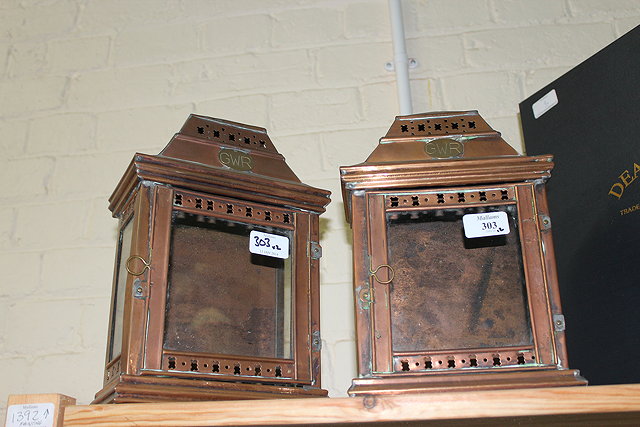 Appraisal: A PAIR OF COPPER THREE GLASS RAILWAY STATION TYPE CANDLE