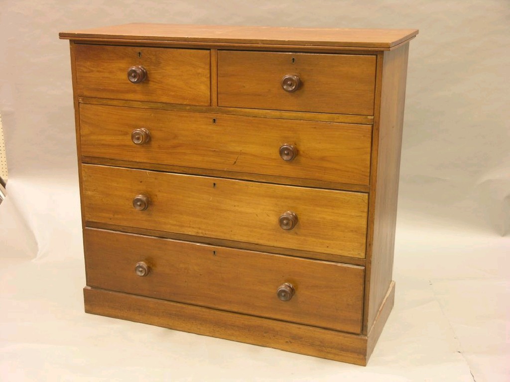 Appraisal: A Victorian solid walnut chest of drawers two short and