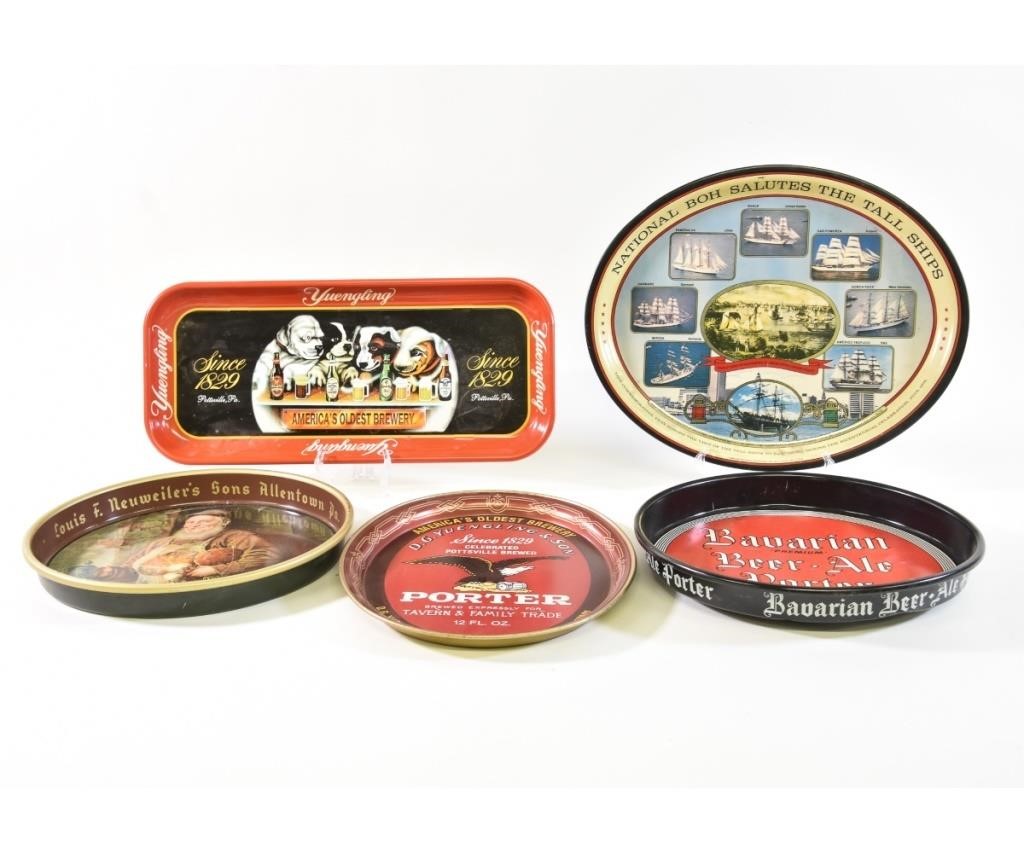 Appraisal: Five Beer Trays including a round Louis F Neuweiler's Sons