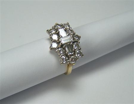 Appraisal: An ct gold mounted diamond cluster ring claw set with