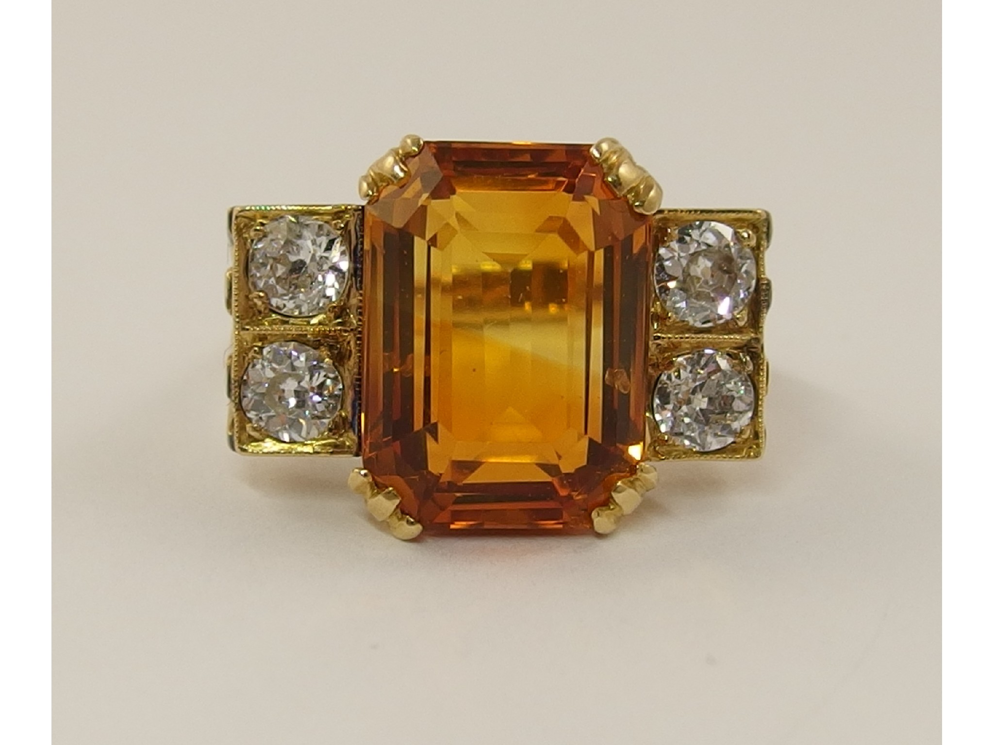 Appraisal: An ct Art Deco cocktail ringset with a bicolour citrine