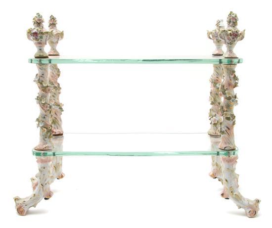 Appraisal: Continental Porcelain Two Tier Display Shelf having urn form finials