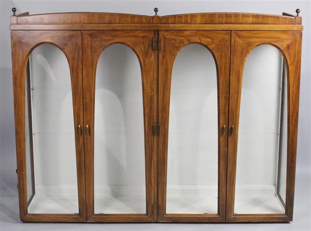 Appraisal: GOTHIC STYLE WALNUT VENEERED VITRINE CABINET the rectangular case fitted