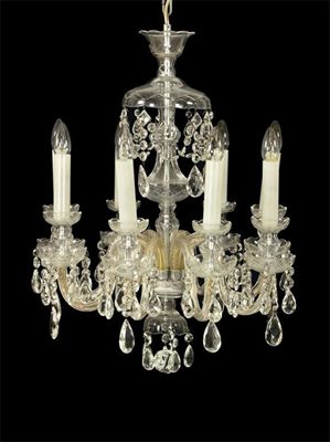 Appraisal: A glass eight light electrolier with scroll branches and hung