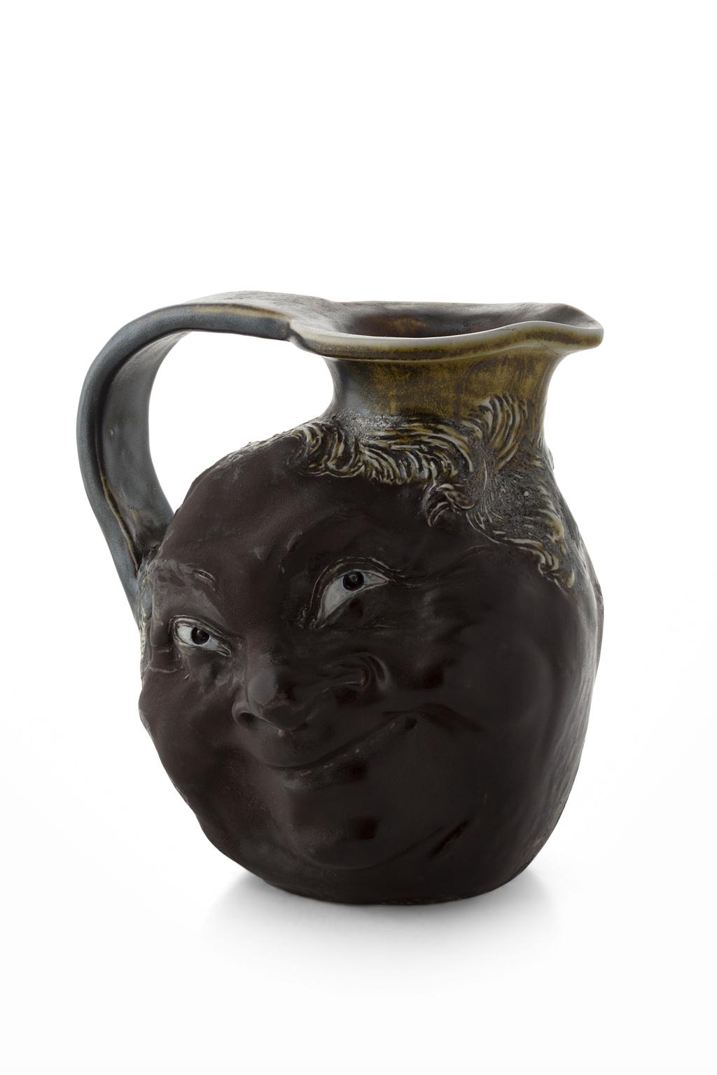 Appraisal: MARTIN BROTHERS STONEWARE CHARACTER JUG 'S decorated by Clement Martin